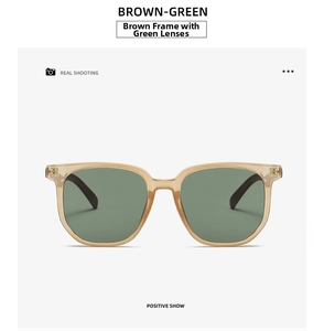 Detail of square tea-colored frame sunglasses with wood grain temples and green lenses