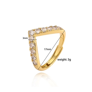 Detailed view of V-shaped gold ring with zircon stones, 3mm width and 17mm diameter dimensions