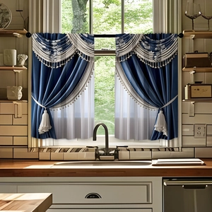 Detail of dark blue and beige double-layered kitchen curtains with tassels and embroidery