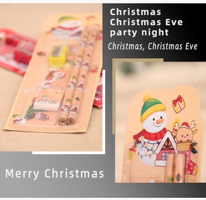 Detail of Christmas stationery set including festive pencils, eraser, ruler and sharpener