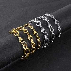 Detail of stainless steel chains in gold and silver with secure lobster clasp closures