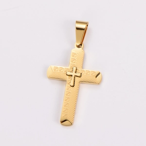 Macro shot of gold stainless steel cross pendant featuring textured diagonal patterns