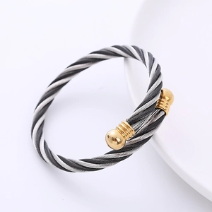 Pulsera de cable minimalista con tejido bicolor y terminales de bola dorados