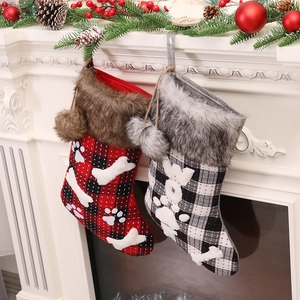 Classic plaid Christmas stockings with faux fur collar and cute bone bone bone decor