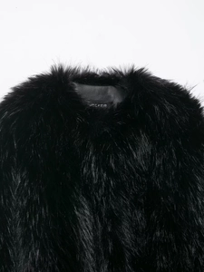 Detailed close-up of the black faux fur collar showing premium texture and long hair fibers