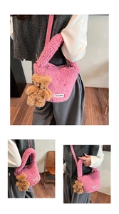 Detail of pink plush crossbody bag with cute teddy bear pendant and soft fleece texture