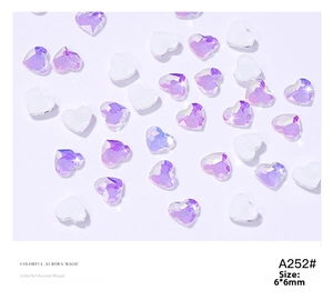 Macro detail of 6x6mm aurora purple heart rhinestones for 3D nail art decoration
