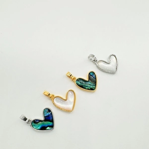 Four 18K gold and silver plated heart pendants with natural shell and abalone inlays