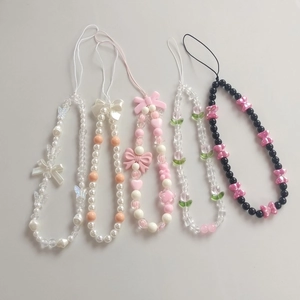 Five beaded phone straps with cute butterfly bows and tulip charms in mixed colors