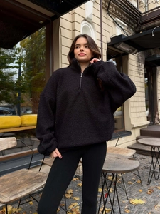 Women's black sherpa fleece jacket with half-zip collar and warm loose fit street style