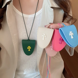 Detail showing cross embossed leather glasses holder in various colors with neck straps