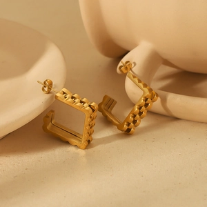 Retro U-shaped gold stainless steel earrings with geometric square wave texture pattern