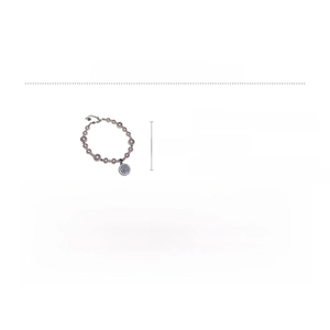 Detailed view of pearl bracelet with zircon pendant and adjustable lobster clasp closure