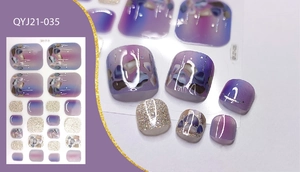 Detail of purple gradient toe nail stickers with shell texture and silver glitter accents