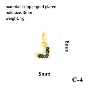 Detailed macro view of 18K gold plated heart pendant with blue zircon and 3mm hole size