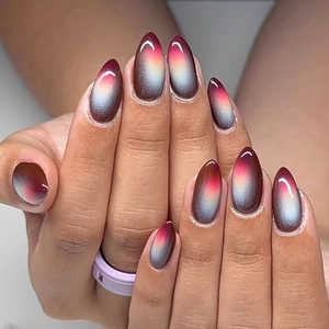 Medium almond press-on nails featuring a glossy red, grey, and dark brown gradient design