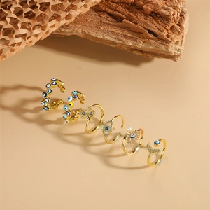 Bohemian evil eye and fishtail ring set with gold plating, zircon, and pearls