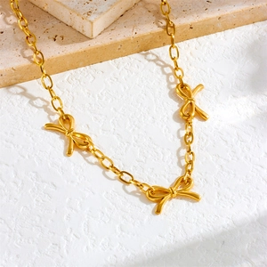 Minimalist gold plated stainless steel chain necklace with three bow-knot pendants