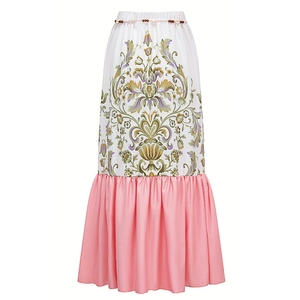 Detailed view of bohemian floral print and ruffled hem on a V-neck ethnic swimsuit set