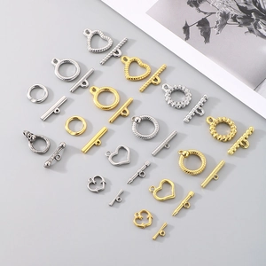 Assorted stainless steel toggle clasps in heart and textured styles in gold and silver