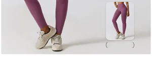 Détail du pantalon de yoga taille haute violet foncé en tissu extensible à séchage rapide
