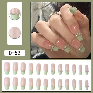 French green ballet press-on nails with mint tips, rhinestones, and long square shape