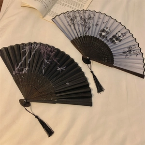 Traditional ink painting folding fans with bamboo, dragonfly and panda patterns on white
