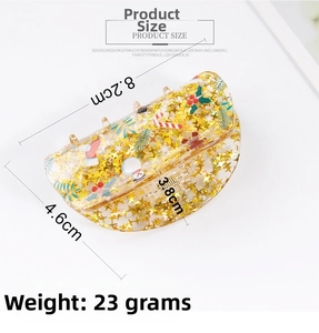 Detail showing dimensions of a clear Christmas hair claw clip with festive sequins