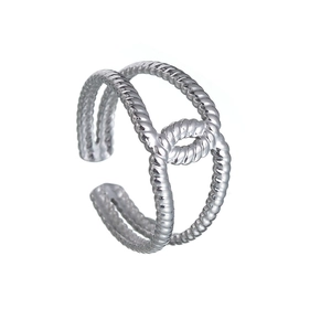 Detail view showing the silver rope-textured double-layered design and center knot of the ring