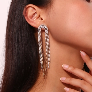 Fashion 18K gold plated arched earrings with long zircon tassels on female model