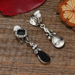 Retro Bohemian clip-on earrings with black waterdrop pendants and sparkling crystals