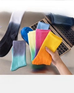 Detail showing the soft and skin-friendly fabric of multi-color gradient crew socks