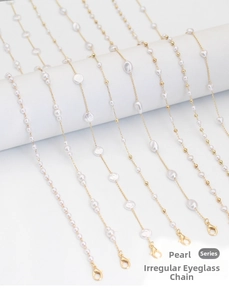 Detail of elegant gold chain with diverse white pearls and lobster clasps for eyewear