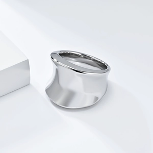 Minimalist wide silver stainless steel ring with curved asymmetric polished surface