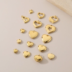 Detail showing a variety of gold stainless steel heart pendants for DIY jewelry making