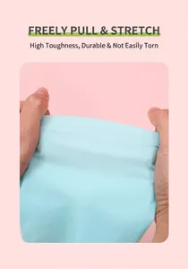 Elastic blue silicone icing bag being stretched to show durability and high flexibility