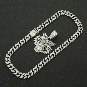 Iced out silver Cuban link chain necklace with detailed 3D tiger head crystal pendant