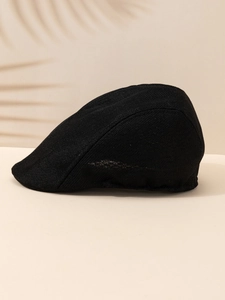 Detailed side view of breathable black mesh flat cap with vintage linen texture