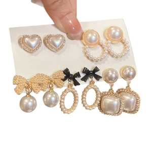 Elegant 5-piece earring set featuring pearls and rhinestones on a gold-plated base