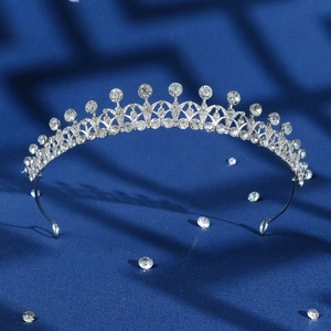 Silver bridal tiara with sparkling rhinestones for wedding ceremonies and party hair styling