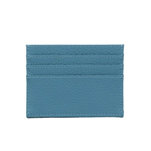 Detail of blue pebble grain leather card holder with three card slots on white background