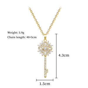 Detailed specs of the gold key pendant necklace featuring crystal studs and chain length info