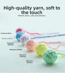 Detail view of colorful soft knitted yarn cat toy balls in rainbow and macaron colors