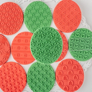 Christmas fondant stamp set with snowflake elk and tree patterns on red green dough
