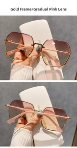 Close-up of frameless geometric pink gradient sunglasses with elegant gold frame details