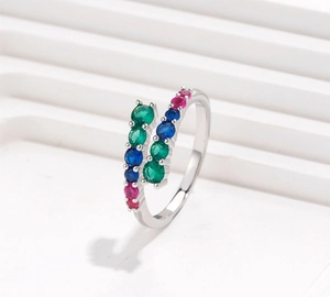 Close-up of S925 silver adjustable ring featuring red, blue and green zircon stones