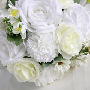 Elegant bridal bouquet with white roses and pompon mums for wedding photography