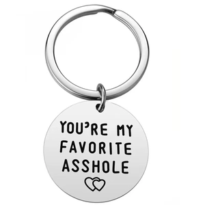 Polished silver stainless steel round keychain with engraved romantic quote and heart icon
