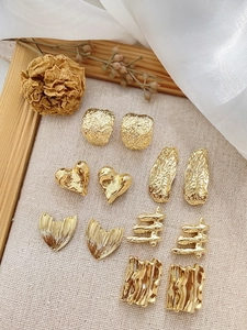 Detailed collection of 14k gold plated irregular heart and textured stud earring components