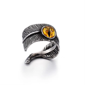 Vintage punk feather ring in stainless steel with yellow cat eye stone embellishment